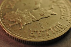 A close up of a coin on a table